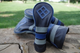 Custom Champion Stripe design.

Stealth Black body with cobalt blue and grey leather accents!

