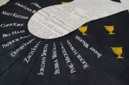 Leather cut and artwork completed prior to assembly for 2015 Presidents Cup Gifts for the players.